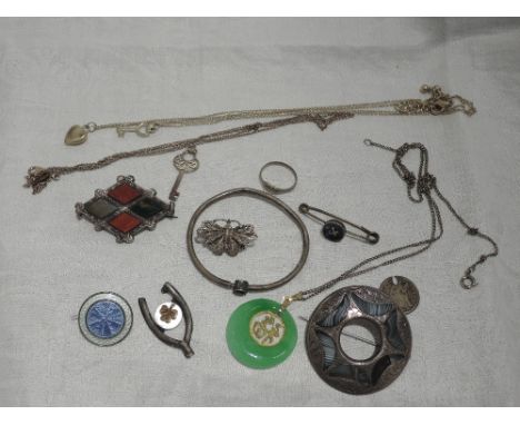 A selection of white metal jewellery including Celtic brooches and enamel guilloche brooch, bangle, chains etc