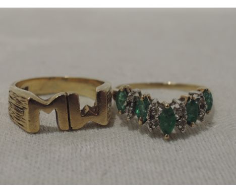 A lady's dress ring of wishbone form having five marquise cut emeralds interspersed by diamond chips, (some missing) on a 9ct