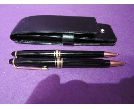 A Montblanc Rollerball and Ballpoint pen set in Montblanc leather case