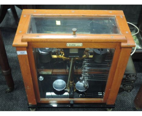 A set of vintage electrical laboratory scales in case, by Oertling, model 122