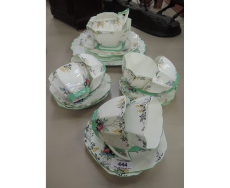 A 1920's design tea service by Shelley having floral decoration, RD 723404DISCOLOURATION TO WHITE BODY, NO VISIBLE FAULTS OR 