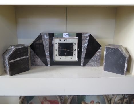 An Art Deco marble clock garniture - the square silvered dial with Arabic numerals