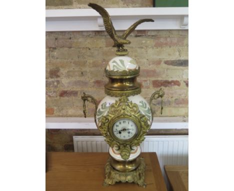 A large ornate modern mantle clock with a quartz movement - Height 84cm