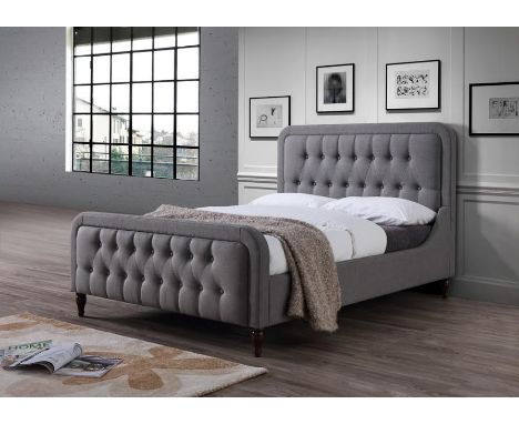A good quality Hyatt upholstered 4ft 6in bed in light grey