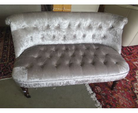 A crushed velvet two seat sofa - Width 125cm x Depth 60cm x Height 70cm