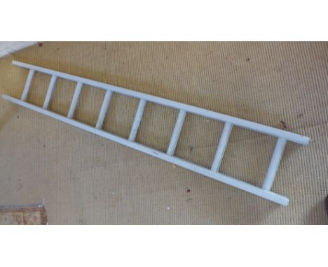 A vintage 8 rung ladder, painted - 7cm x 29cm x 190cm High