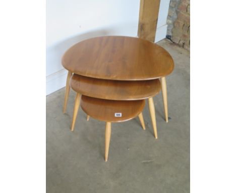 An Ercol 'Pebble' nest of three side table - in good clean condition