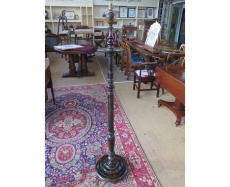 A chinoiserie black lacquered standard lamp - Height 157cm