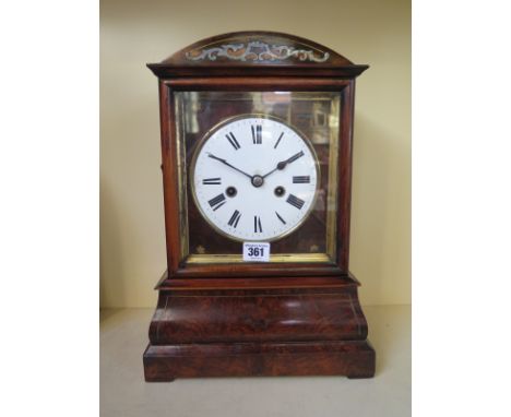 A late 19th century German walnut cased mantle clock, strikes on coiled gong - Height 15 inches