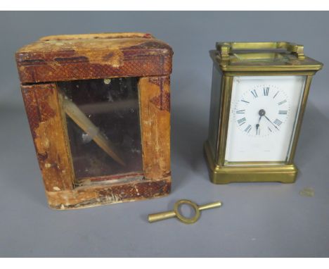 A French brass carriage clock retailed by Asprey - Height 12cm - not working, chip to dial and small chip to front glass, out
