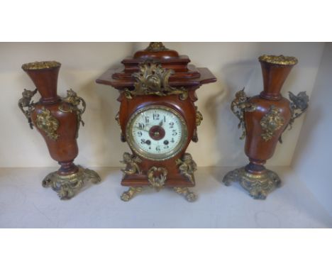 A 19th century Continental clock garniture with gilt metal mounts fitted with brass movement signed Lenzkirch - largest piece