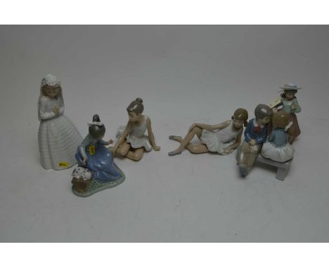 Two Nao figures of ballerinas, the tallest 16cms high; along with four other Nao figures including a bride and girl with a pu