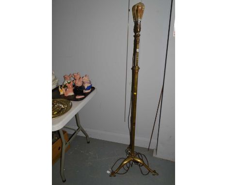 Brass standard lamp (likely Benson), height adjustable, on tripod support. 