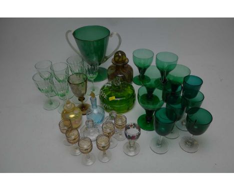 A selection of glassware, including: a set of six green and clear glass wine glasses; five green glass wine glasses with knop