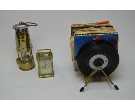 Early 20th century brass carriage clock, in glazed case, 11cms high; along with other items including a brass miners lamp; We