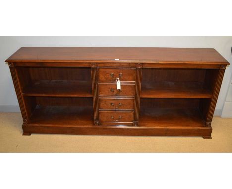 N.H. Chapman &amp; Co Ltd, A 'Siesta' mahogany low bookcase, the rectangular top with moulded edge above a central bank of fo