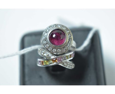 Two gemstone set rings, one red and white cluster, the white metal shank stamped '585'; and a coloured and white stone ring, 