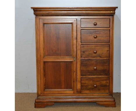 A 20th Century mahogany side cabinet, the projecting cornice with a bank of five short drawers to one side and panelled cupbo