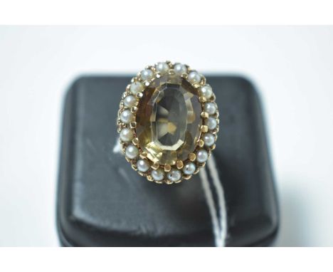A quartz and half pearl cluster ring, on 9ct yellow gold shank. 