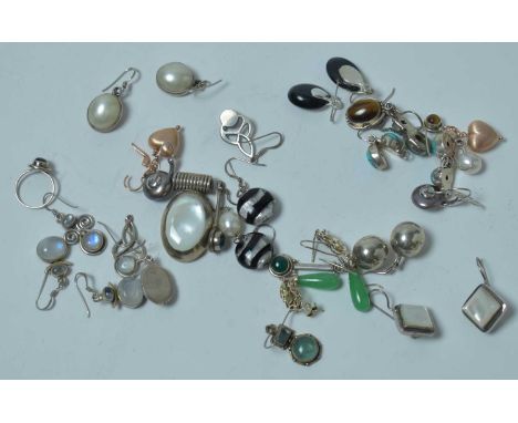 A quantity of contemporary white-metal and other artisan made jewellery, predominantly ear pendants set with semi-precious ge