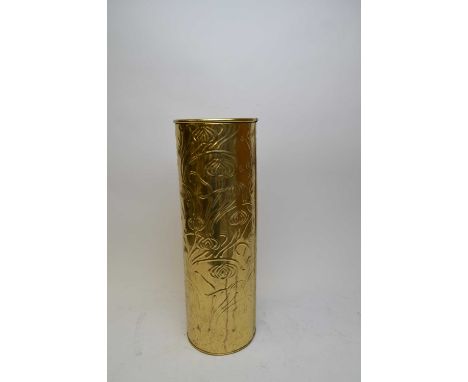 Brass stick stand, of cylindrical form, embossed with stylised flowers, 51.5cms high; along with a Crawford &amp; Black artis