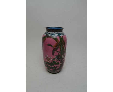 Japanese cloisonne enamel vase, decorated with a birds in a forest scene, on a pink ground, 30.5cms high. 