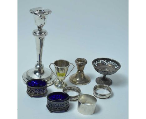 A group of silver items, including a candle stick by I S Greenberg and Co, Birmingham, 1913, 20cms, a pair of silver salts by