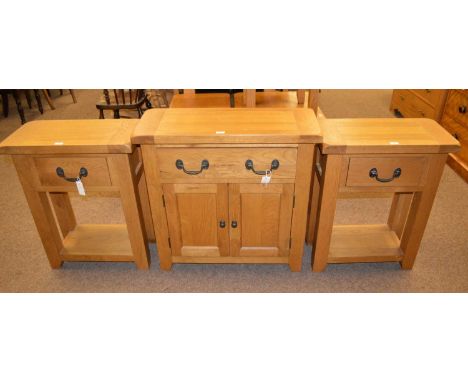 A group of three 20th Century oak occasional furniture, comprising: two side tables, each with rectangular top above single f