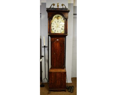 Thomas Bell, Hexham: a 19th Century oak longcase clock, the 12 1/2in. painted dial with roman hours, subsidiary seconds and d