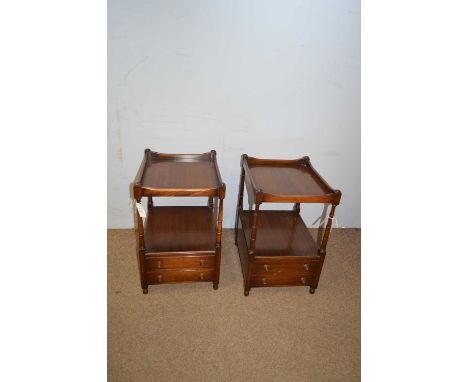 A pair of 20th Century mahogany bedside tables, the rectangular gallery top above ring turned supports, raised on two long dr