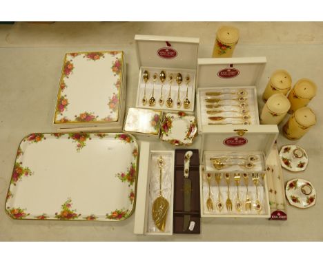Royal Albert Old Country Roses: to include two trays, boxed placemats and coasters, boxed cake knife, candles, boxed cutlery,