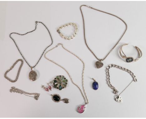 A good group of sterling silver and silver coloured metal jewellery, includes bangles, chains, bracelets, locket, brooches et
