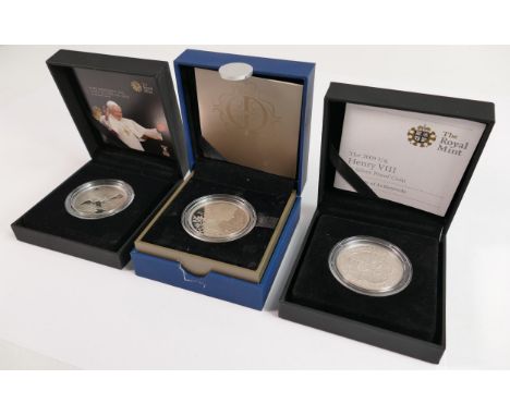 A collection of Royal Mint silver proof £5 coins: comprising 2012 Queens Diamond Jubilee, 2009 Henry VIII and 2010 Pope Bened