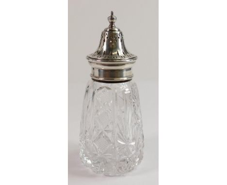 An hallmarked silver topped cut glass sugar sifter:h.16.5cm. 