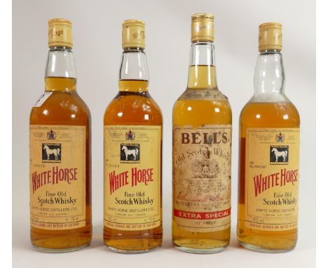 A collection of Vintage Whisky to include Three Bottles of White Horse Scotch Whisky &amp; similar Bells item(4) 