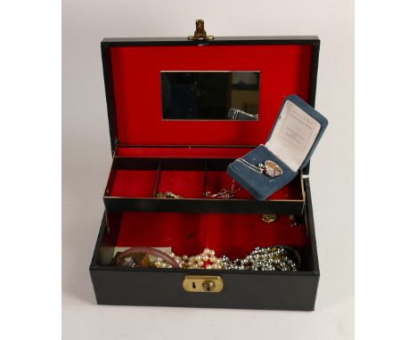 A job lot collection of costume jewellery in  jewellery casket.  Full of interesting jewellery with some silver items noted. 
