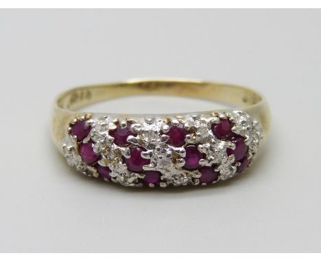 A 9ct gold twelve ruby and thirteen diamond ring, 2.1g, R/S