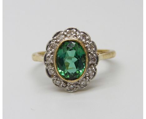 An 18ct gold green tourmaline and diamond cluster ring, 3.5g, M