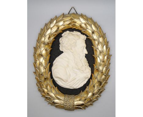 A 19th Century portrait in relief of Sir Peter Paul Rubens in a laurel wreath frame, a/f, re-glued chip on the right side