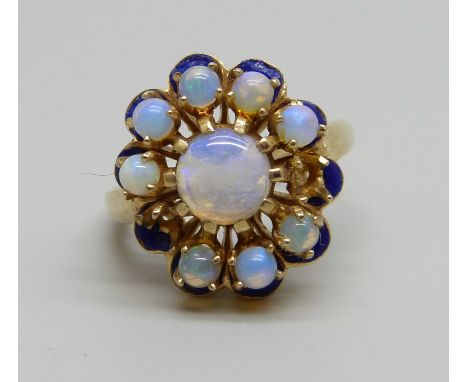 A 14k gold, opal and blue enamelled ring, two missing opals, 8g, P