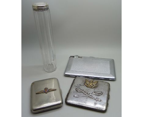 A silver topped glass bottle, two cigarette cases, RAF and US cavalry and a combination lighter/cigarette case