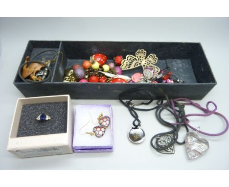 A collection of costume jewellery including earrings, necklaces, a ring, bracelets, etc.
