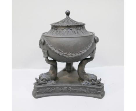 A Wedgwood black basalt pastille burner, on a tripod stand with dolphin legs, 13.5cm