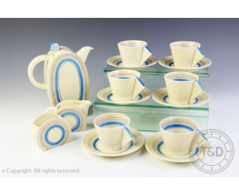 An Art Deco Clarice Cliff Fantasque Bizarre coffee service comprising; a Bonjour coffee pot and cover, six coffee cups and si