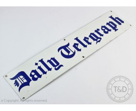 A vintage enamel 'Daily Telegraph' advertising sign, blue lettering against a white ground, 11.5cm H x 51cm W 