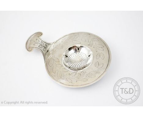 A George V silver strainer, 'The Duchess of Sutherland's Cripples Guild', Birmingham 1912, engraved with leaves and with flow