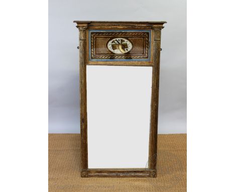 A Regency gilt wood and gesso pier mirror, the central mirror plate below a painted gilt glass panel depicting a lute and whe