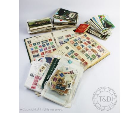 Two stamp albums titled 'Improved postage stamp album' and ' World-wide stamp album' containing an assortment of British, Eur