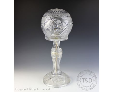 A cut glass table lamp, with spherical shade, 47cm high   CONDITION REPORT:  Lighting lots are sold as decorative items only,