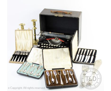 An Underwood Standard portable typewriter, a cased set of six silver tea spoons, three other cased cutlery sets, a pair of pl